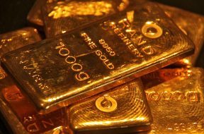 FILE PHOTO: Gold bars are displayed at a gold jewellery shop in the northern Indian city of Chandigarh
