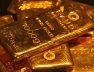 FILE PHOTO: Gold bars are displayed at a gold jewellery shop in the northern Indian city of Chandigarh